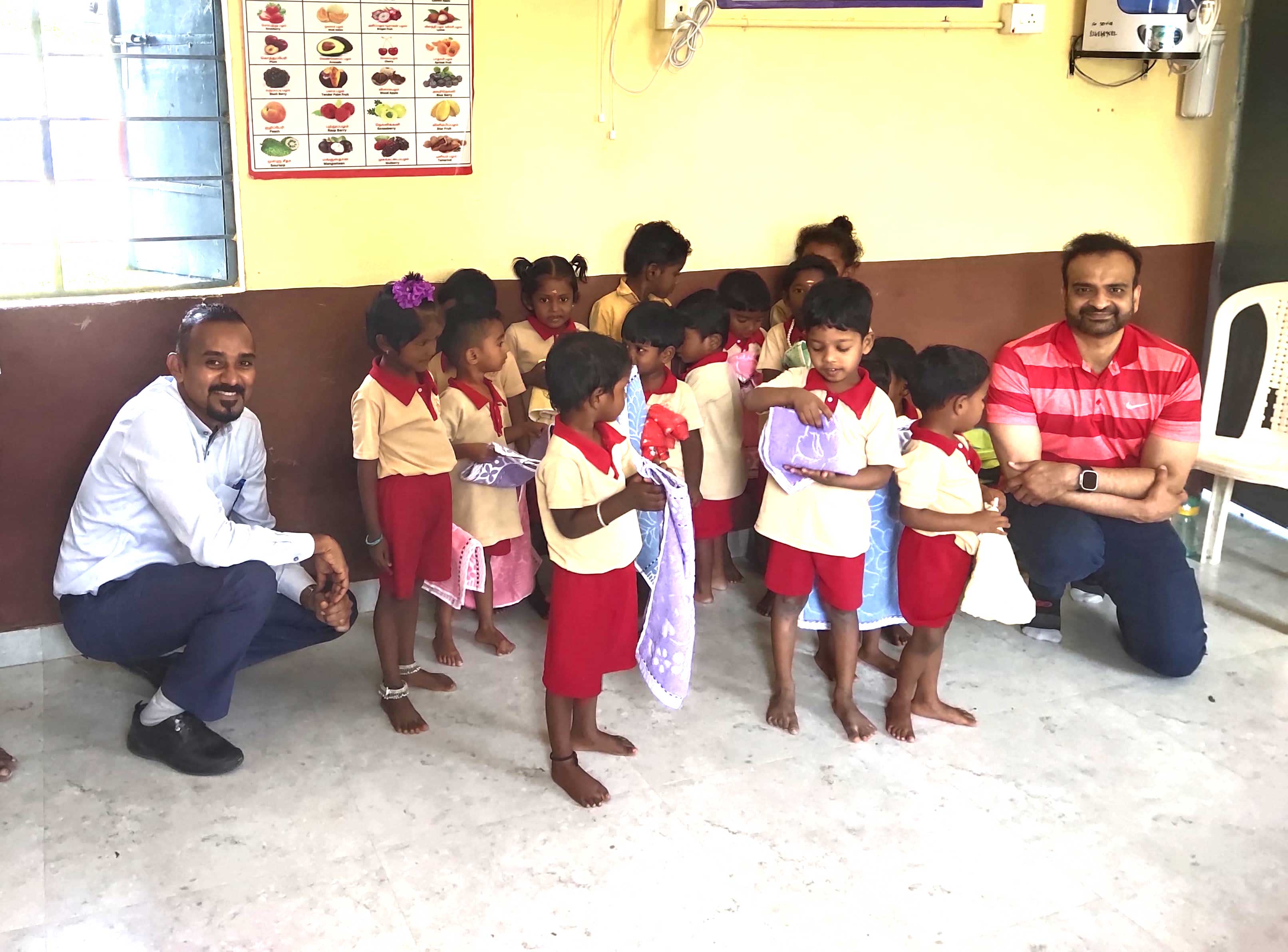 A volunteer team smiling together